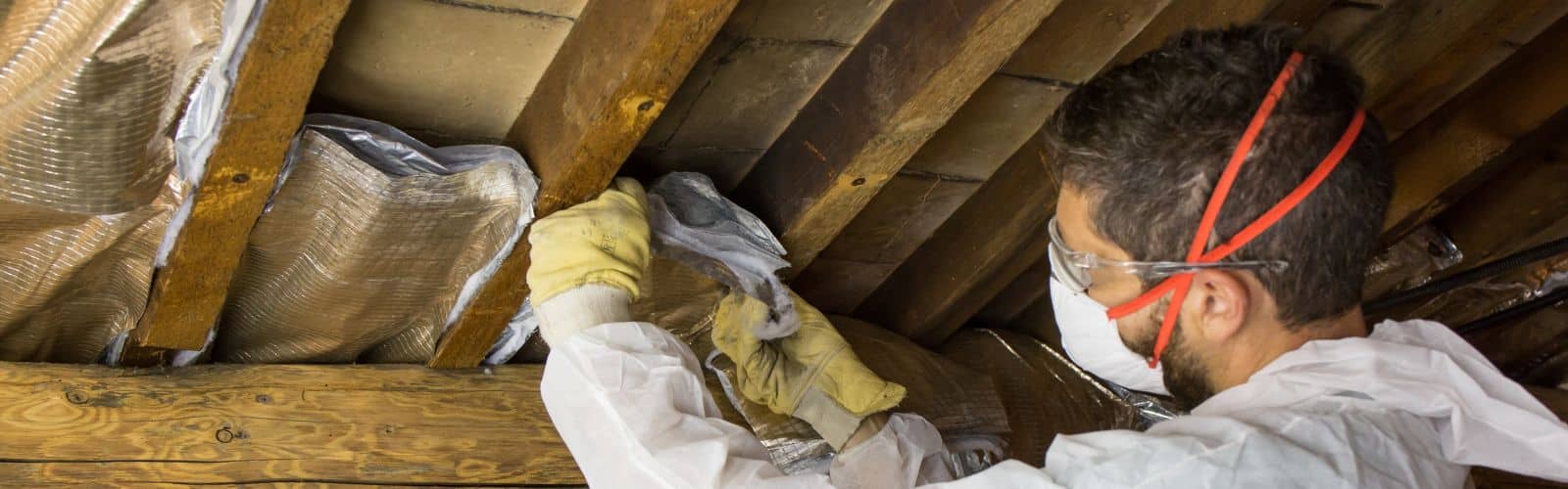 insulation technician installing roof installation